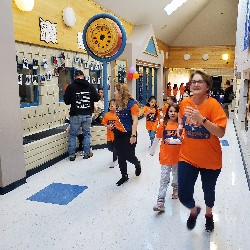 Students running at the Apex fun run