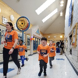 Students running at the Apex fun run