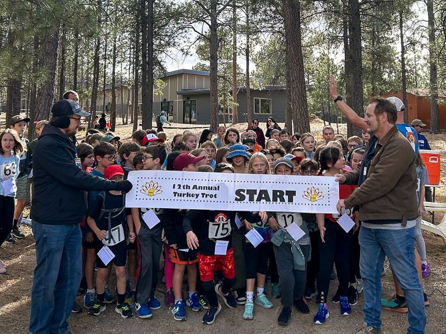 students lined up for the 12th annual turkey trot