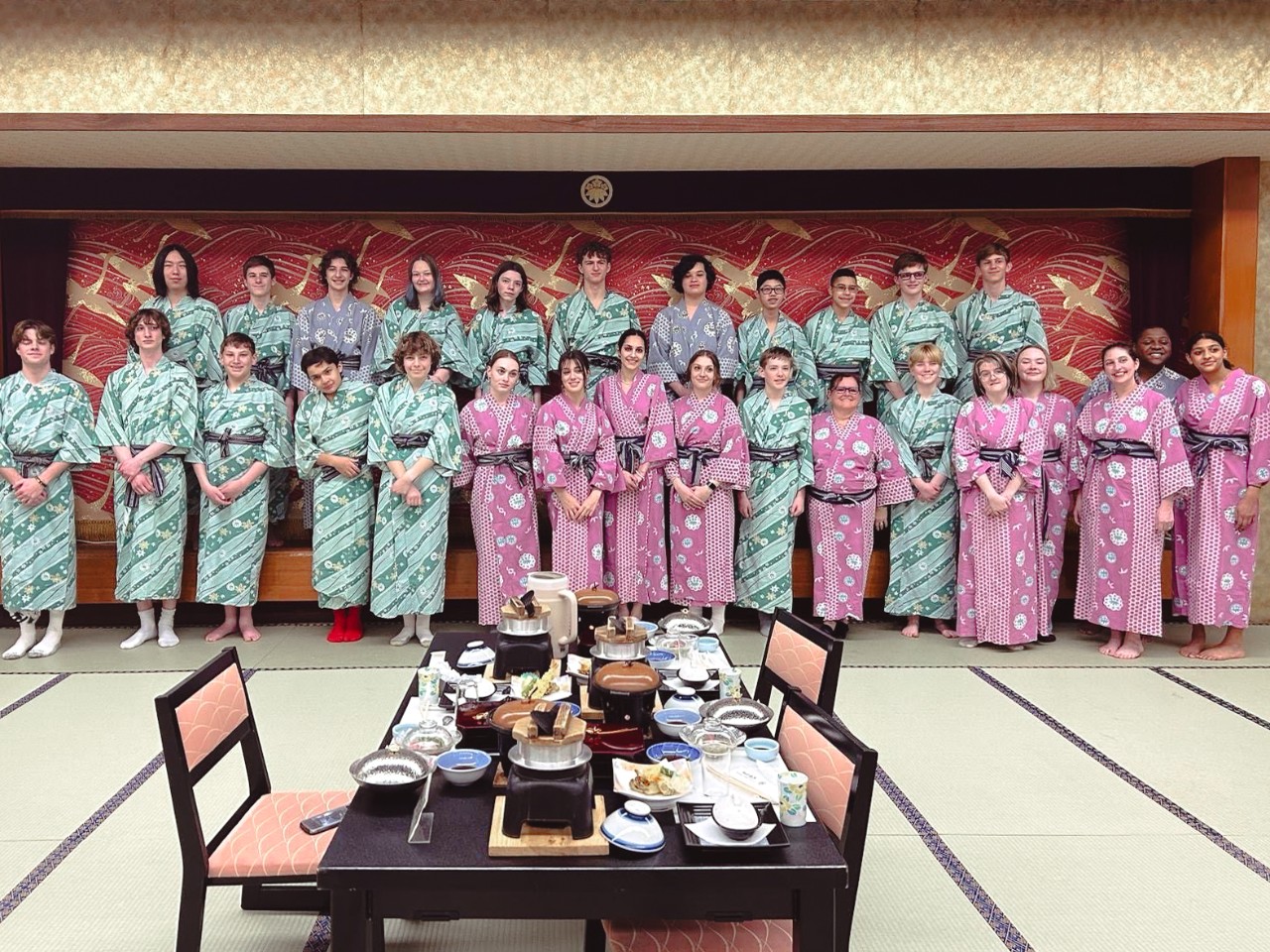 Group photo dressed in traditional Japanese clothing.