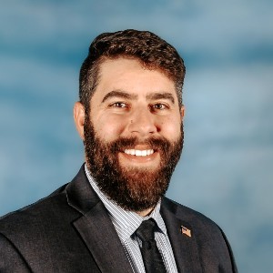 Headshot of Aaron Salt, Board President of Academy District 20 (ASD20) and founder of New Summit Charter Academy. Salt is a key figure in the ASD20 bond proposal (Ballot 4B) controversy, with questions raised about potential conflicts of interest due to charter school allocations in the $83 million bond measure.